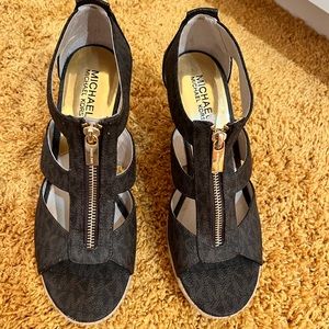 Michael Kors tan and brown wedge sandals.